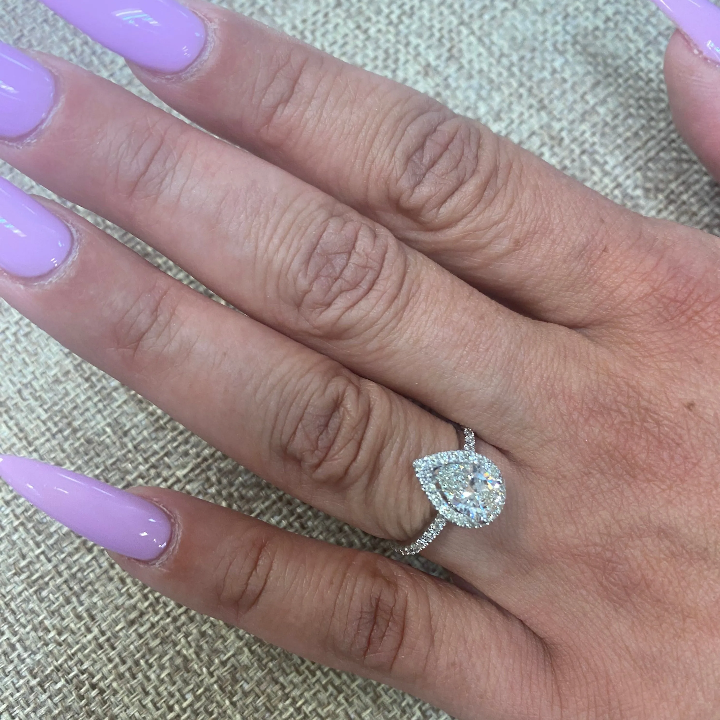 1 ct Pear Shaped Diamond Halo and Side Stones Engagement Ring
