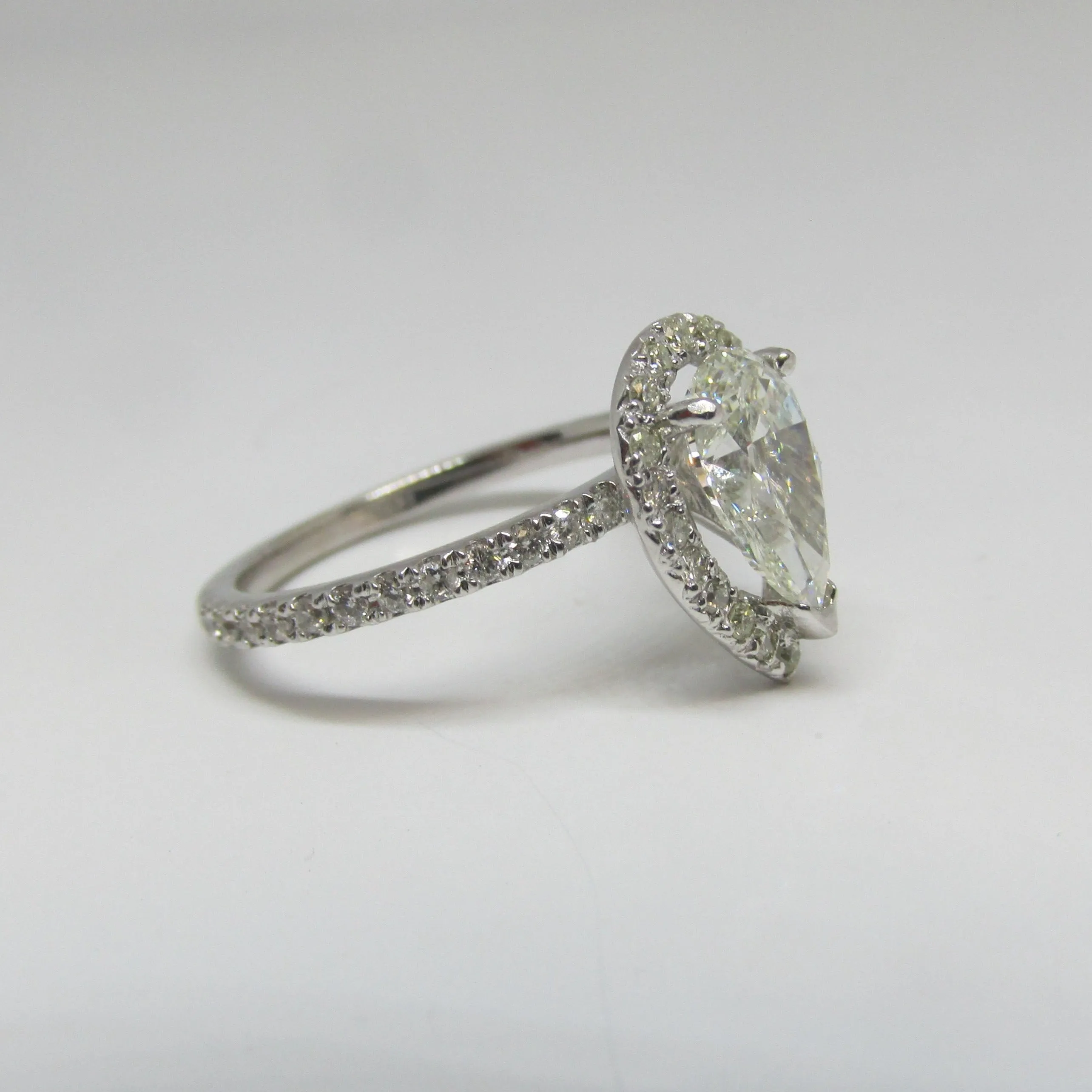 1 ct Pear Shaped Diamond Halo and Side Stones Engagement Ring