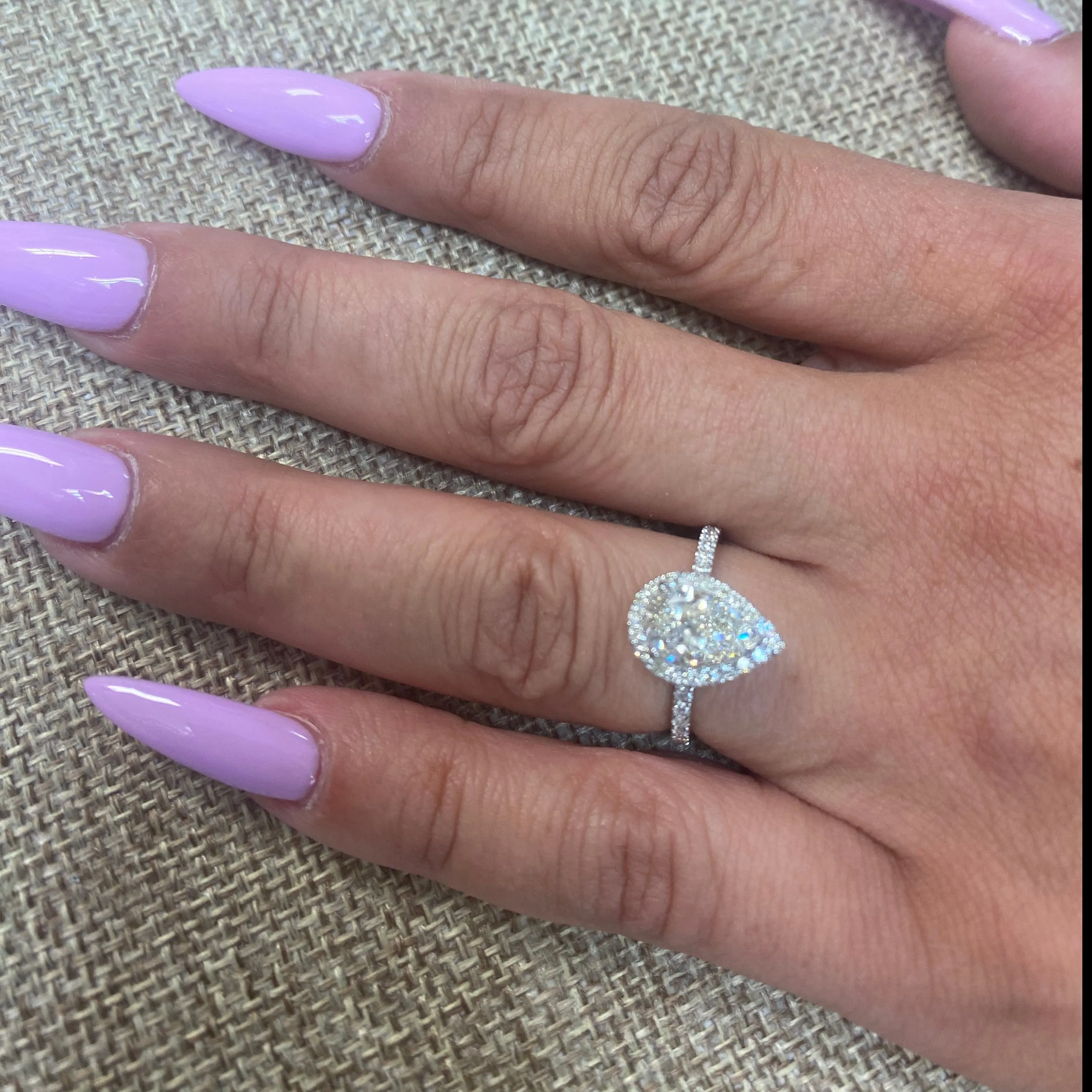 1 ct Pear Shaped Diamond Halo and Side Stones Engagement Ring