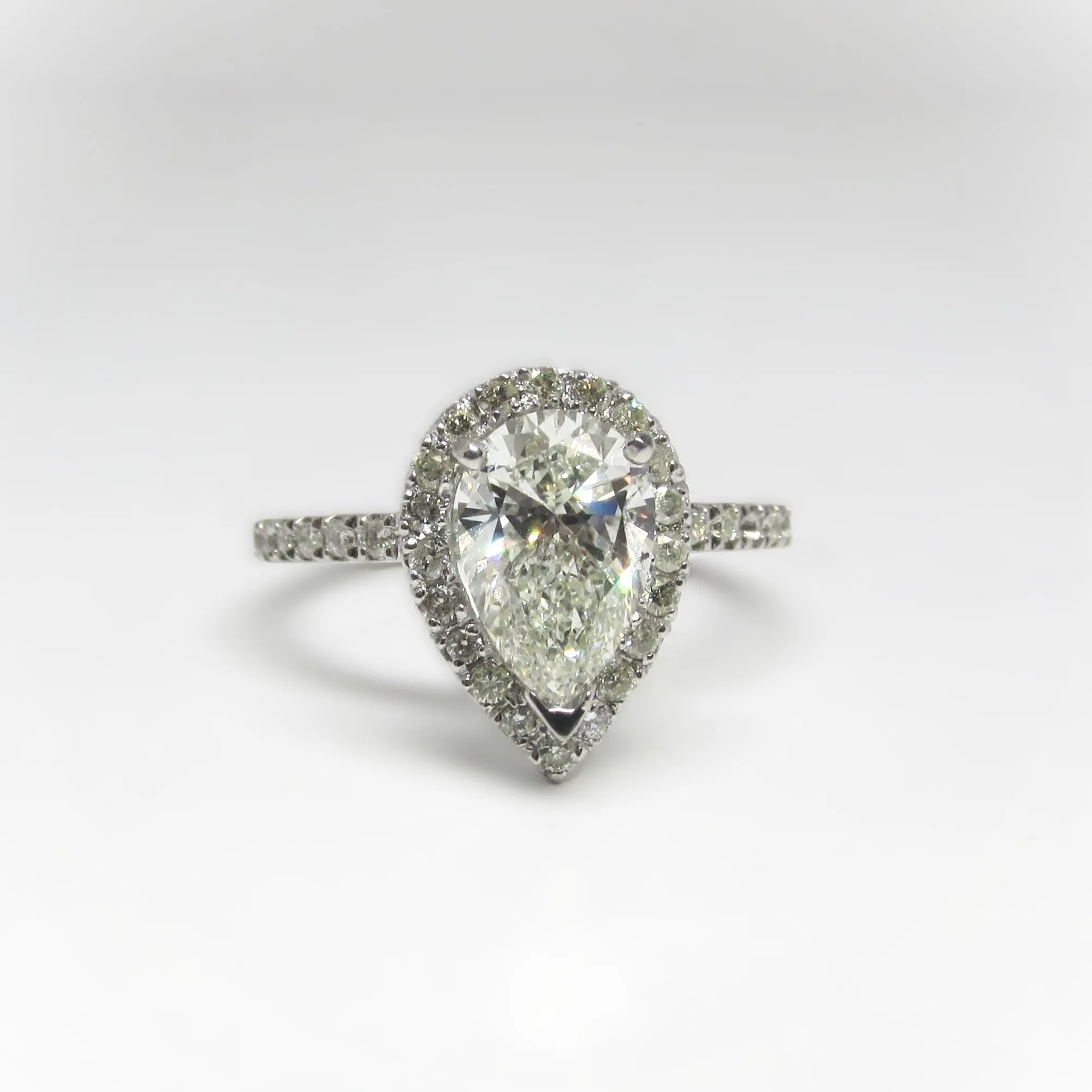 1 ct Pear Shaped Diamond Halo and Side Stones Engagement Ring