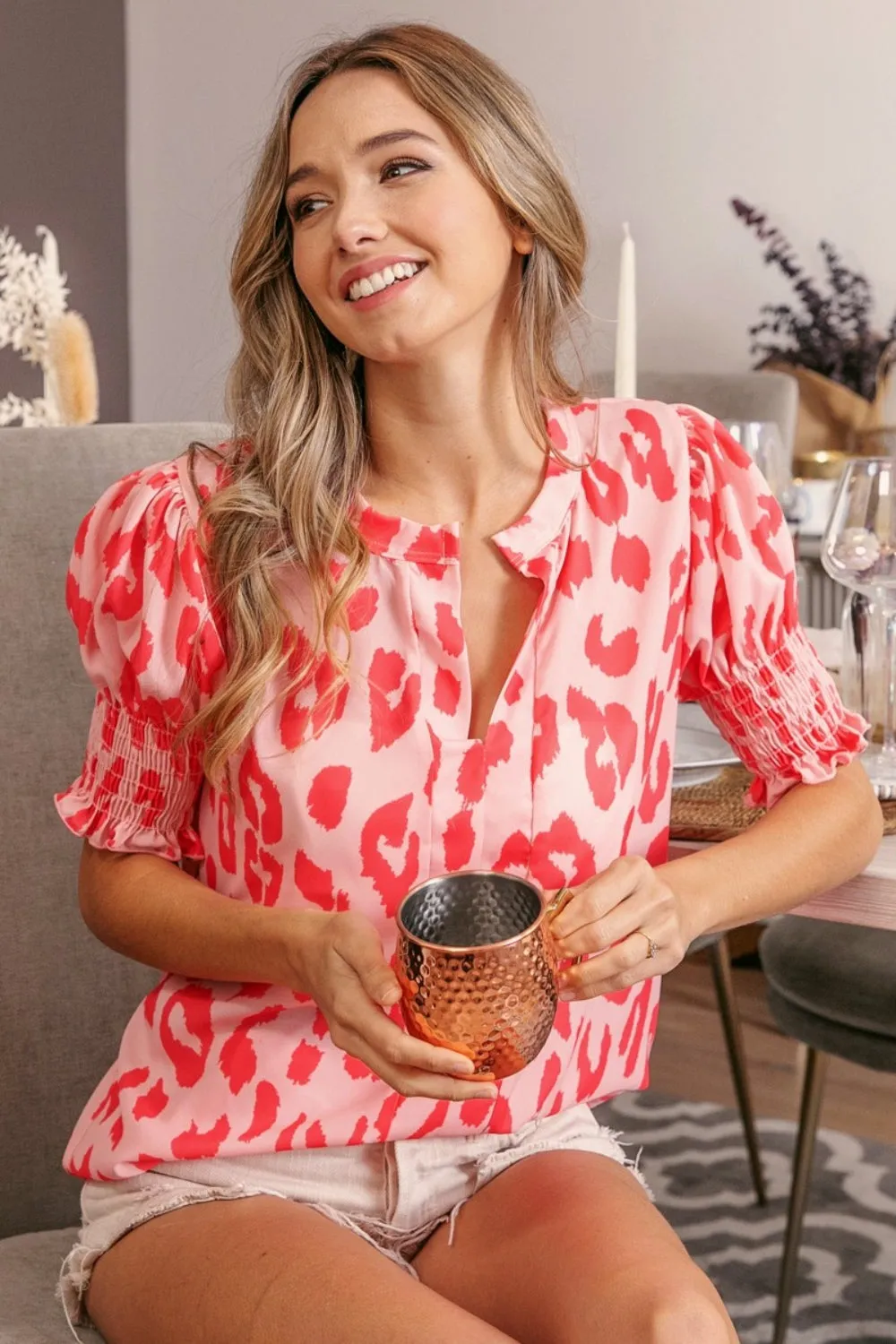BiBi Leopard Smocked Short Sleeve Blouse in Peach Coral