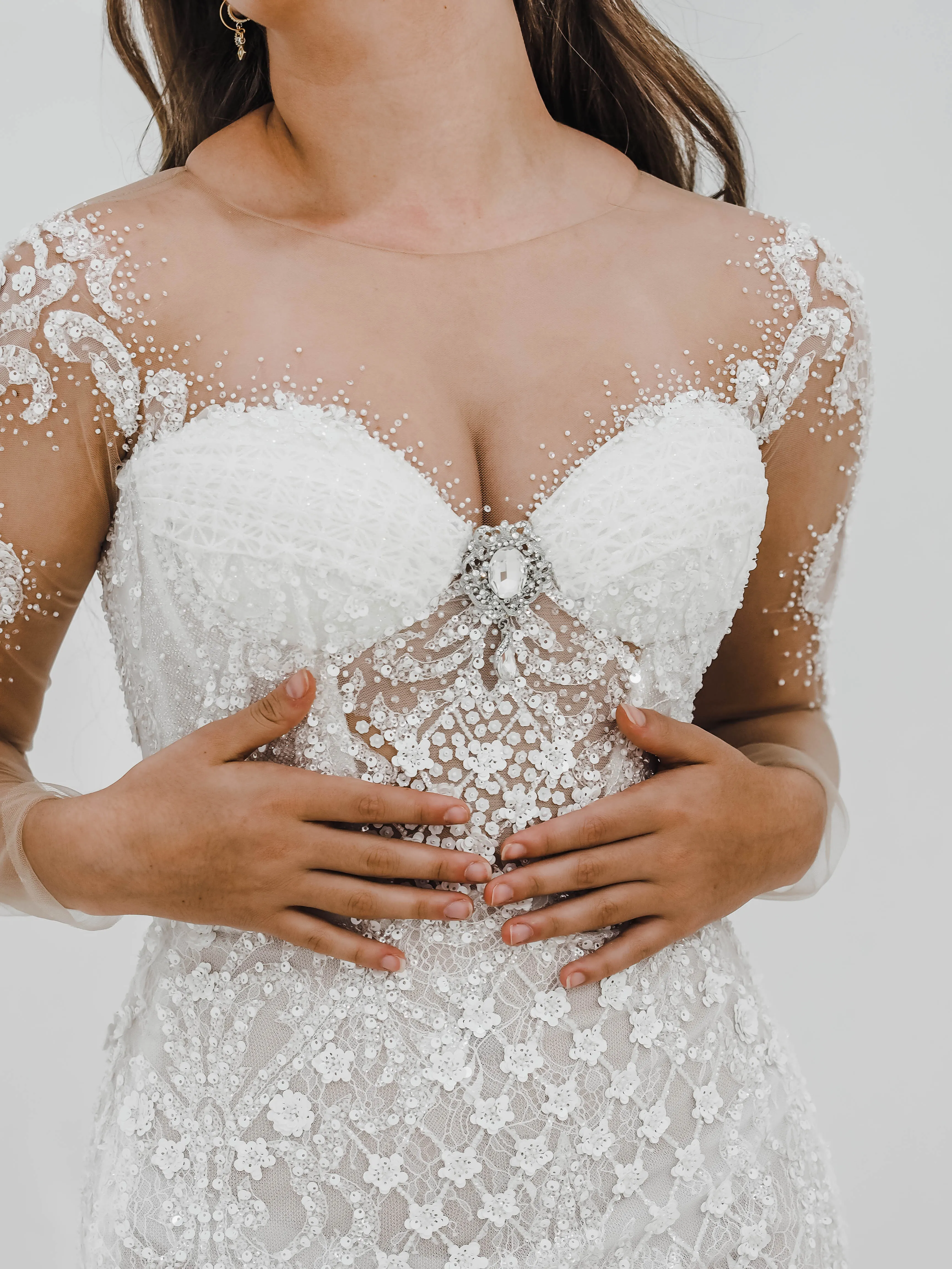 Bustier cups sparkling white lace mermaid dress with sleeves for hire