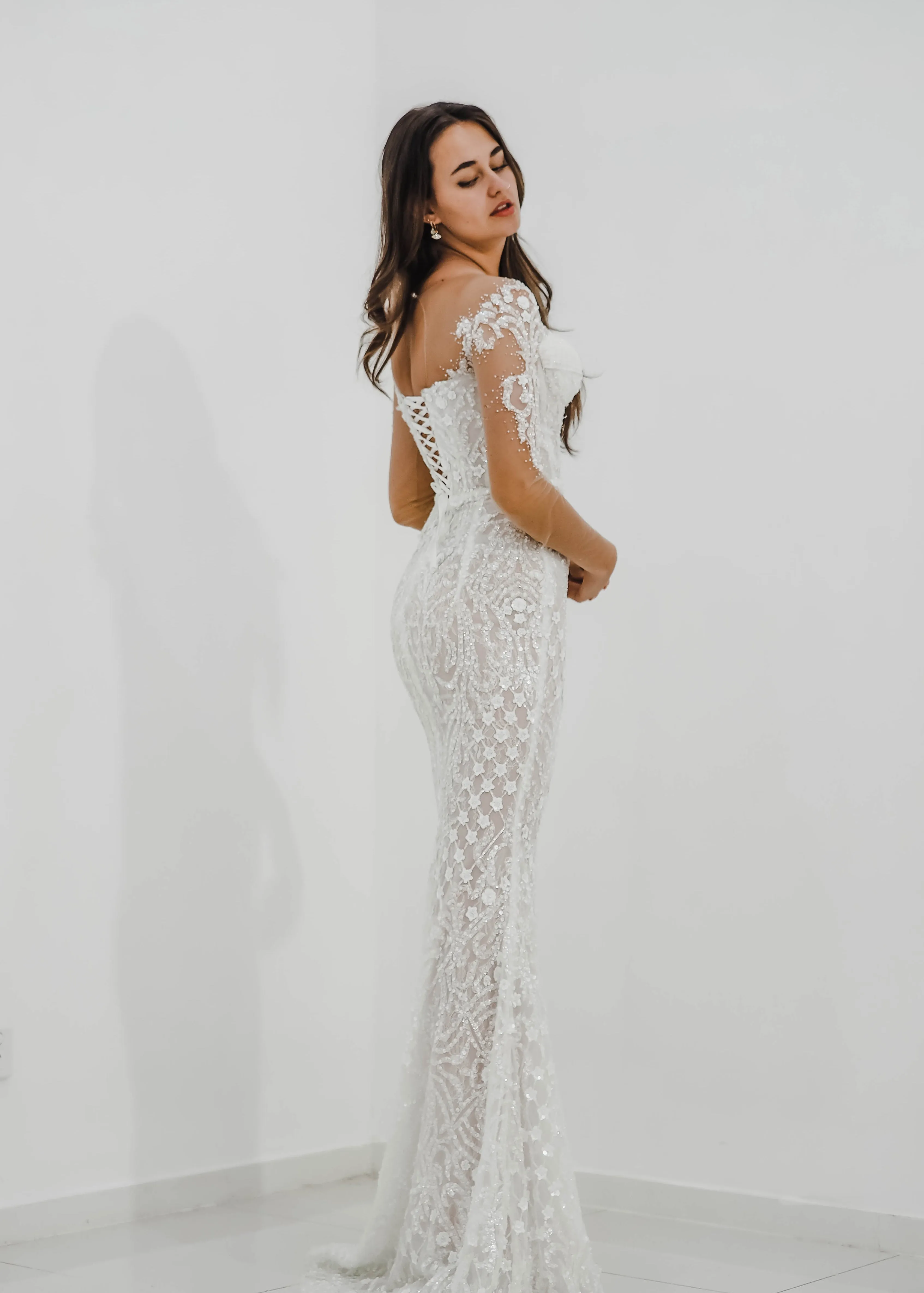 Bustier cups sparkling white lace mermaid dress with sleeves for hire