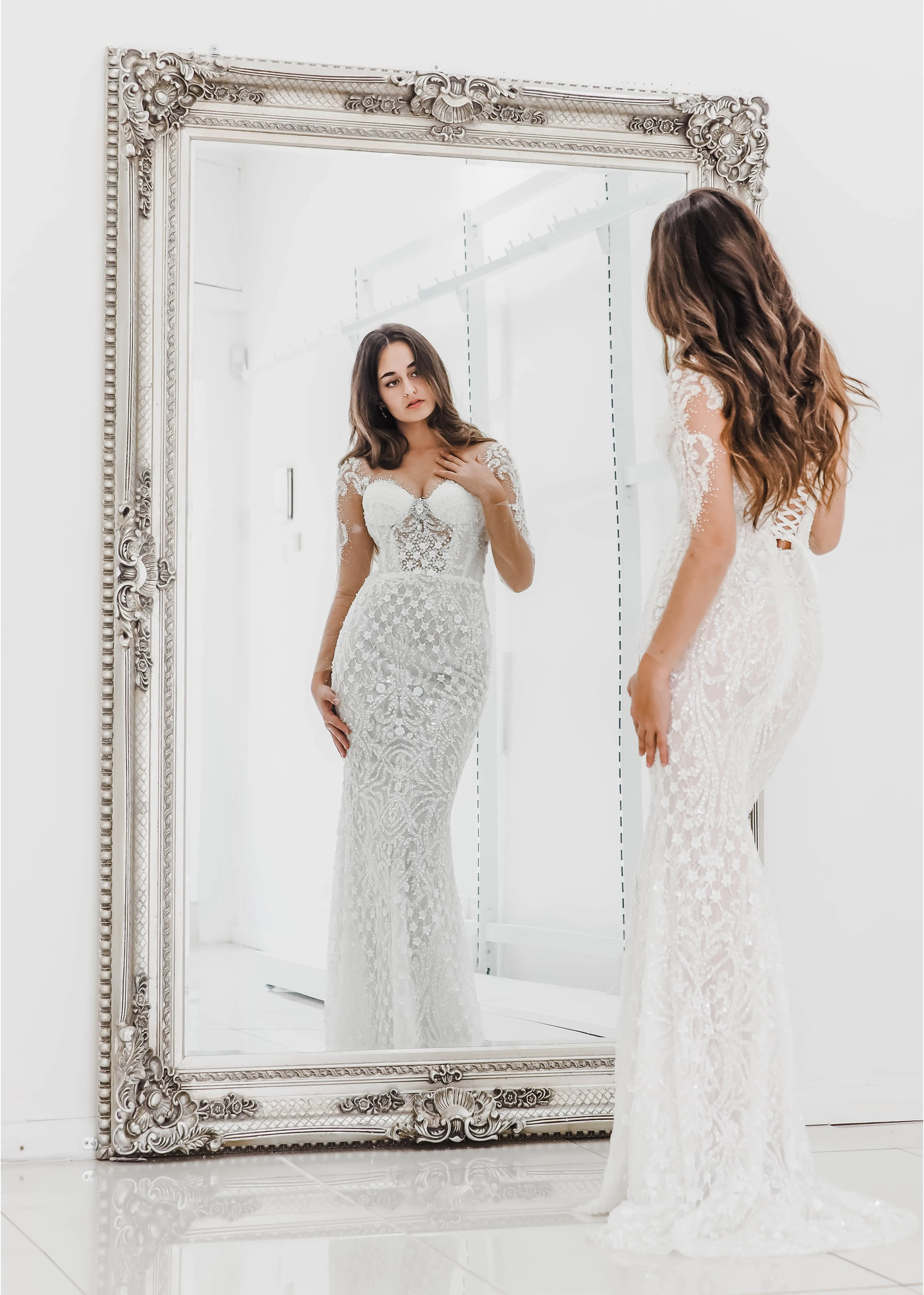 Bustier cups sparkling white lace mermaid dress with sleeves for hire