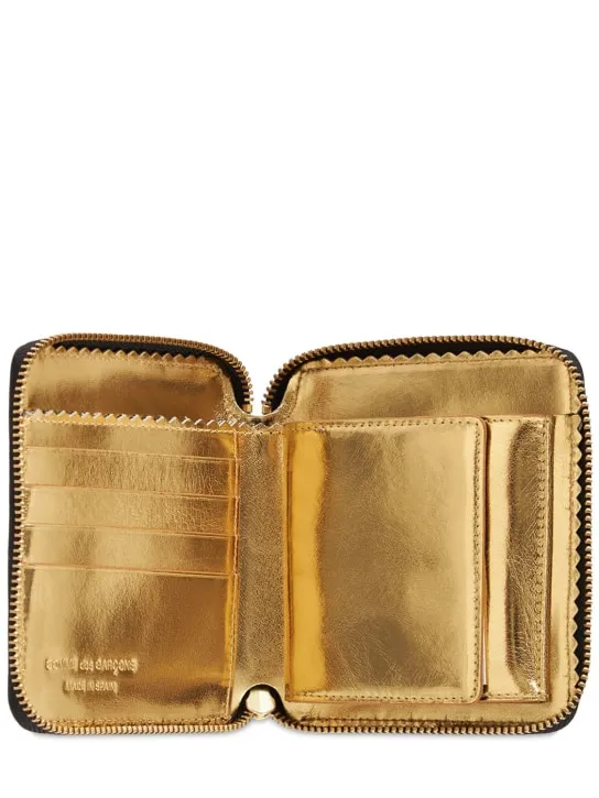 Comme des Garçons Wallet   Zip-up leather wallet 