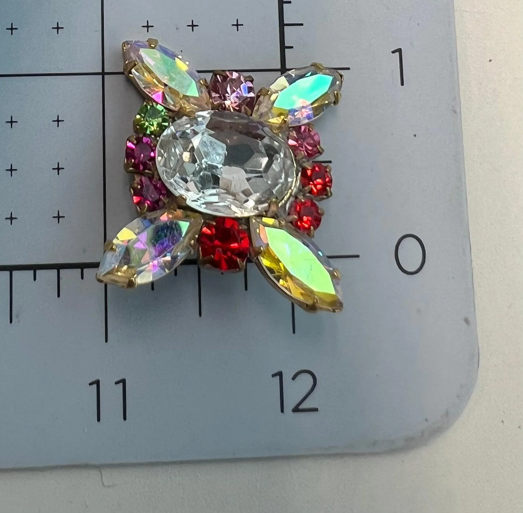 Fancy glass button with a shank