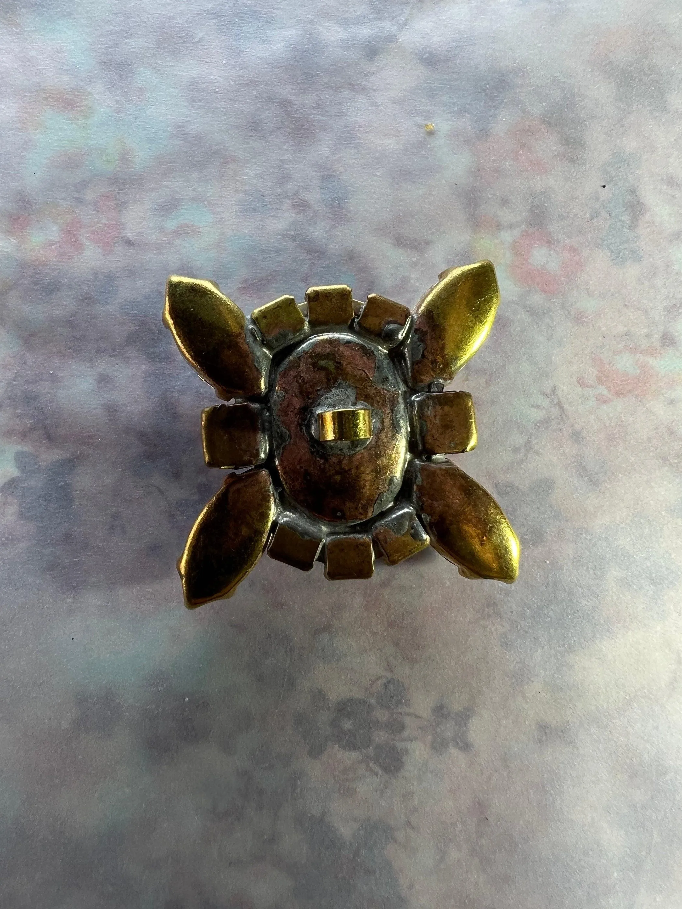 Fancy glass button with a shank