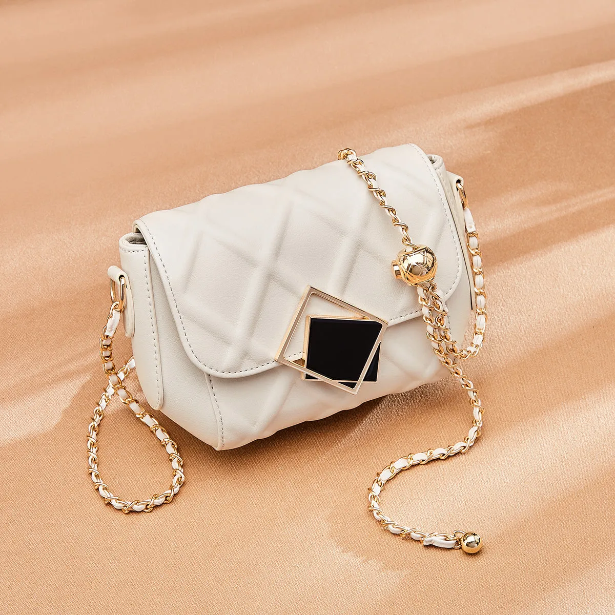 Geometric Lock Quilted Shoulder Bag