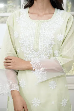 Mint Chikankari Kurta with floral embroidery and delicate lace detailing.