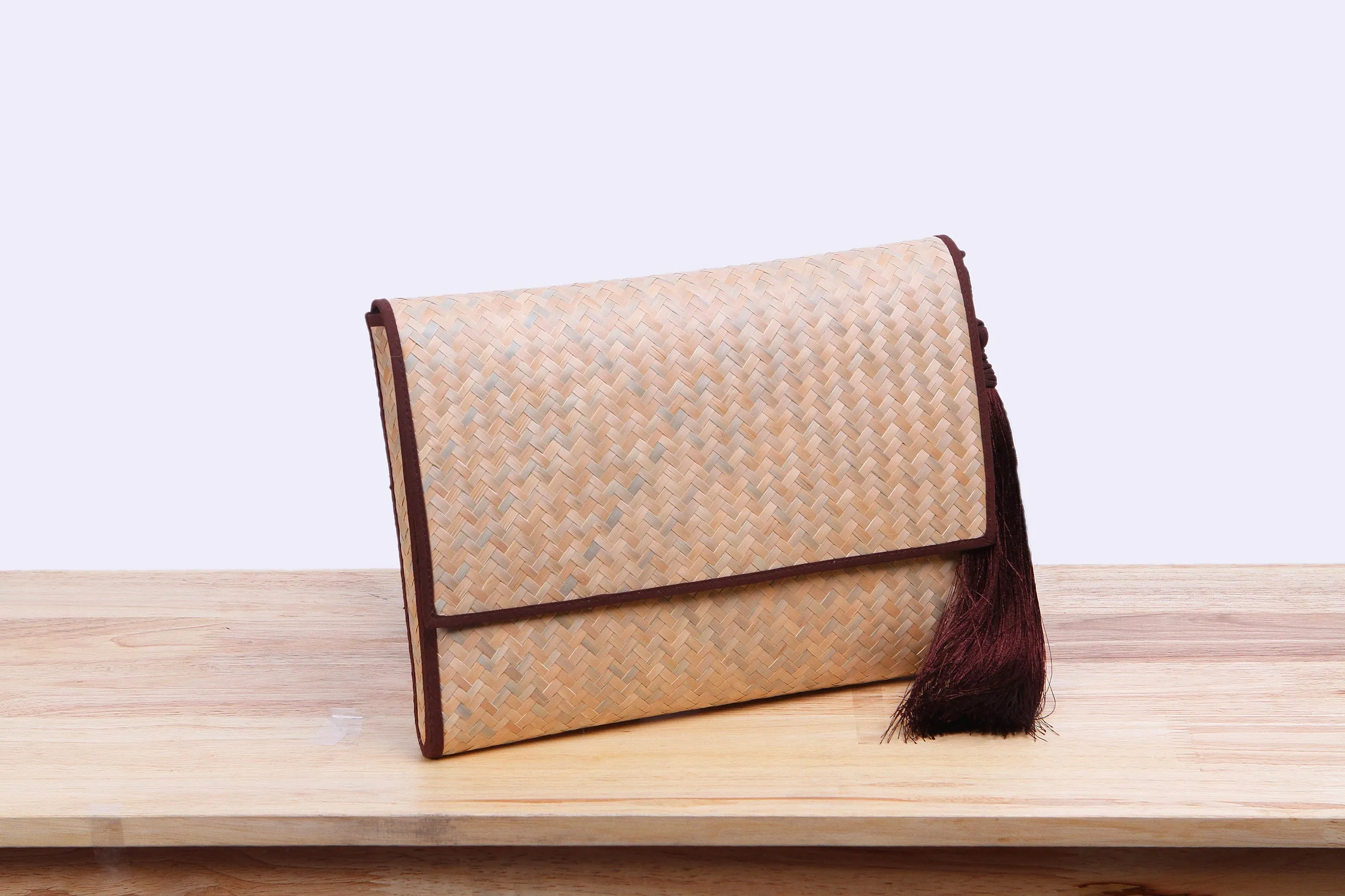 Nattira - Clutch Bag With Tassel (Brown)