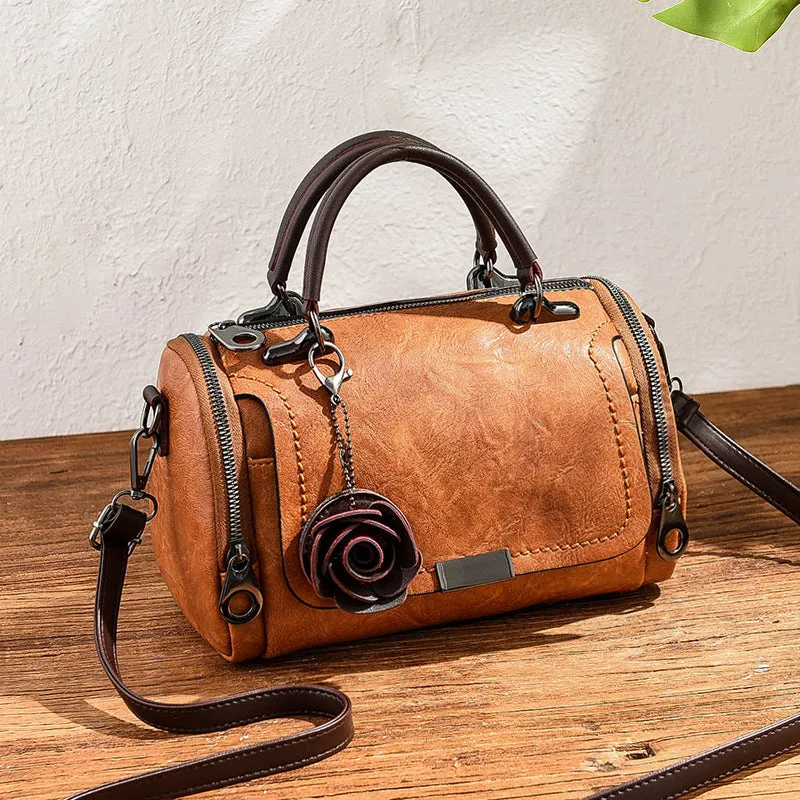 New solid color retro pillow bag women's bag small flower pendant style crossbody shoulder bag