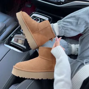 Thick-soled snow boots women's mulberry village short tube winter 2024 new low-top fur integrated pile thickened cotton shoes