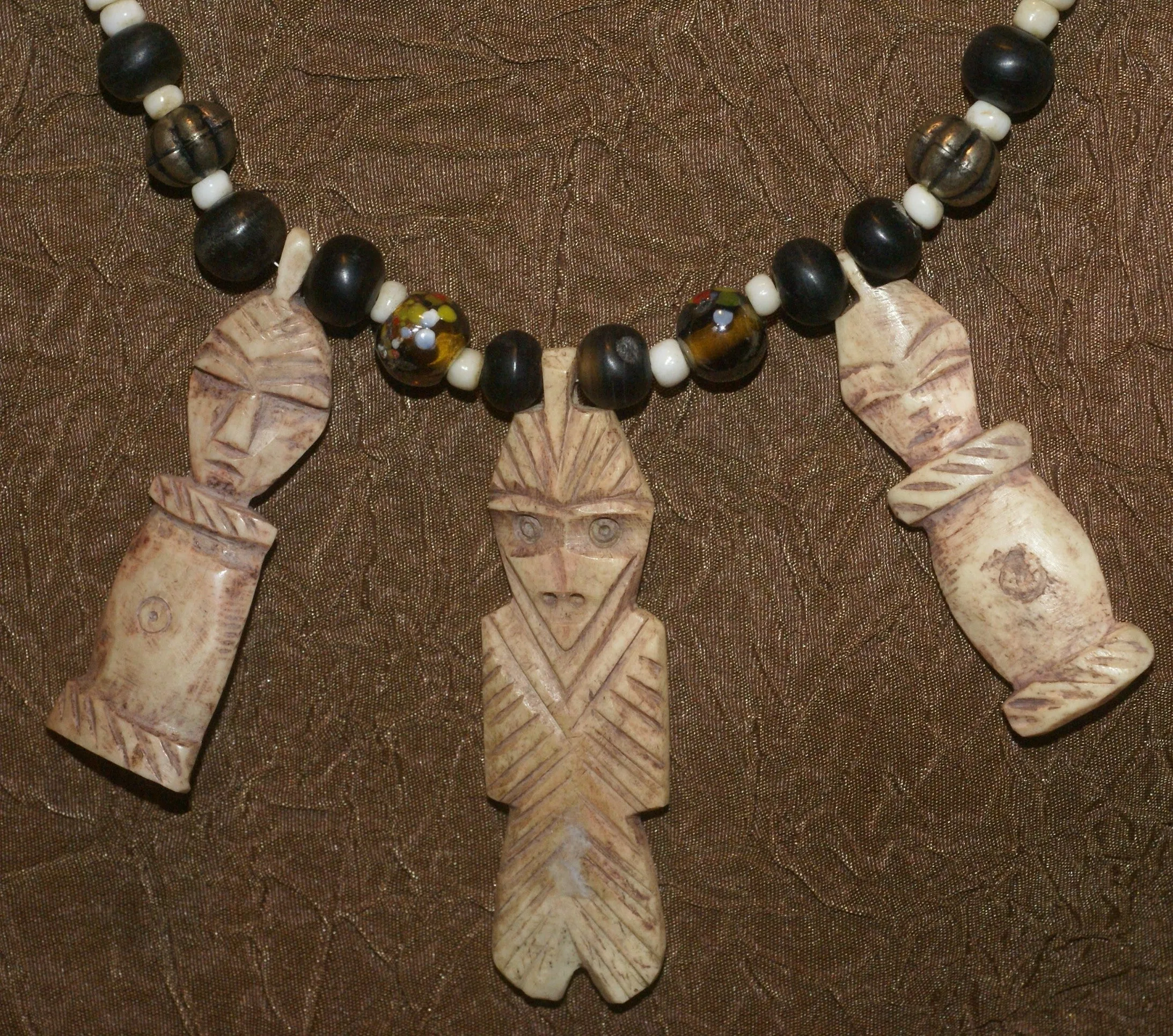 Unique Vintage Hand crafted Ethnic Glass Trade & Metal Beads Necklace with 3 Asian Buffalo Bone Hand Carved Pendants of Protective Ancestor Effigies, Borneo, Indonesia NECK27  1 Flapper Coconut necklace.